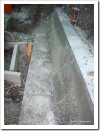 Second upper footing for wall - total thickness of footing = 16"