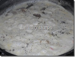 bubbling sauce with seasonings