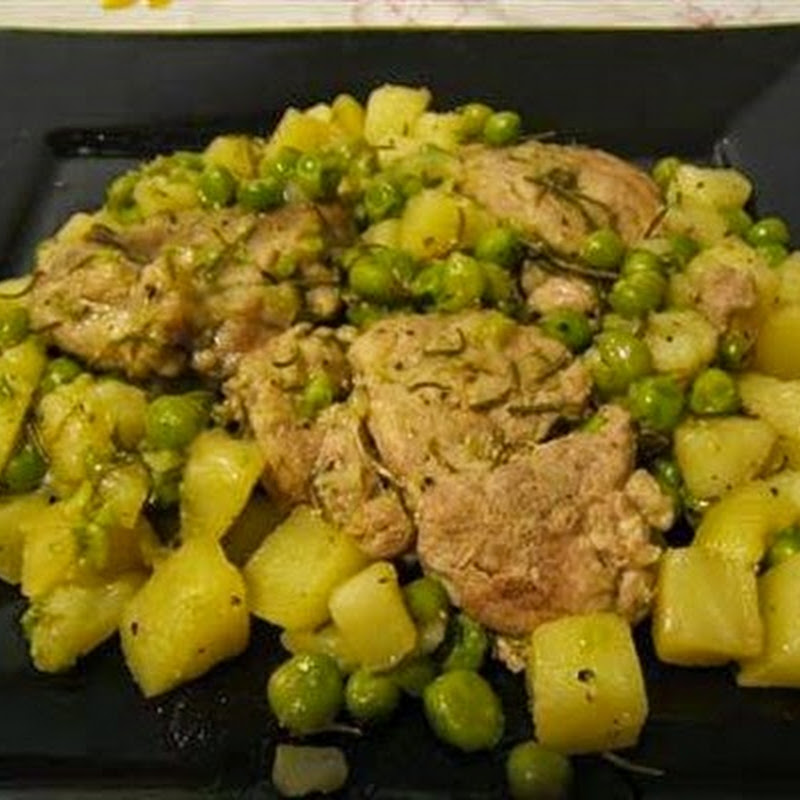 Κρέας με  πατάτες και αρακά
