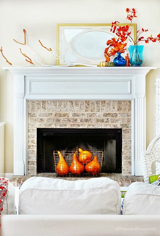 simple-fall-mantel-with-maple-leaves-and-painted-branch