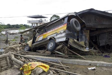 17IGNFLOOD4<br />A passenger jeepney in Barangay Filomena swept by the flood that hit Iligan City Saturday Dec. 17, 2011. MindaNews photo by Bobby Timonera<br />
