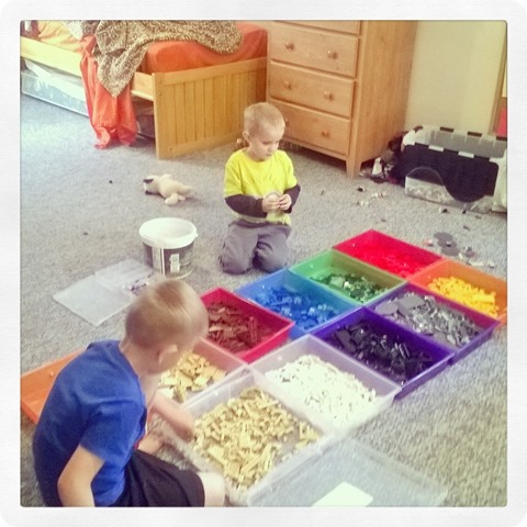 boys separating legos