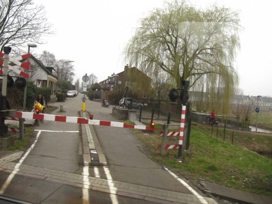 Netherlands bicycle train crossing