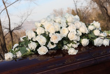 roses on casket (1 of 1)