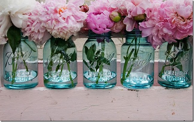 mason jar filled with pink peonies
