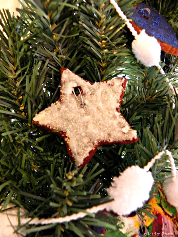 [glittered-cinnamon-ornament-on-wreat.jpg]