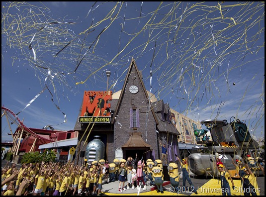 Universal Orlando’s all-new attraction, Despicable Me Minion Mayhem, officially opened to guests on Monday, July 2, 2012, bringing minions, mayhem and tons of laughter to Universal Studios Florida. Gru, his daughters – Margo, Edith and Agnes – and the mischievous minions were joined by dozens of young minion recruits to count down to the ride’s official opening, which culminated in a sea of bursting yellow confetti, pyrotechnics and the hit disco tune, “Boogie Fever.” Celebrity guests Miranda Cosgrove (Margo), Dana Gaier (Edith) and Elsie Fisher (Agnes), who voiced Gru’s daughters in Despicable Me, also attended the festivities and experienced the new ride with the minion recruits. Despicable Me Minion Mayhem is a hilarious and heartwarming new ride that combines a new storyline, new animation, the latest 3-D technology – and the heart, outrageous humor and memorable characters of the hit animated film. Photo Univerasal Orlando
