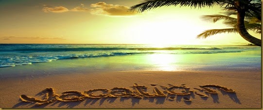 Art Summer vacation concept--vacation text on a sandy ocean beach 
