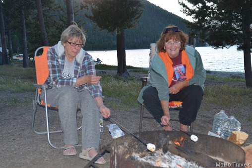 Nancy and Sue making s'mores with less (no crackers)