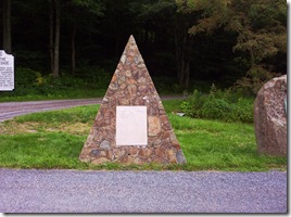 Early photo of Marker D-10 and two other monuments