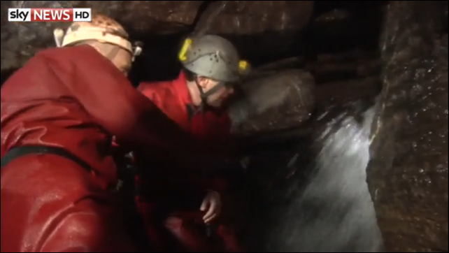 Andy Sparrow of Caveclimb, shows groundwater flowing through caves in the Mendip Hills, on 11 February 2014. This water flows to the already flooded Somerset Levels. Photo: Sky News