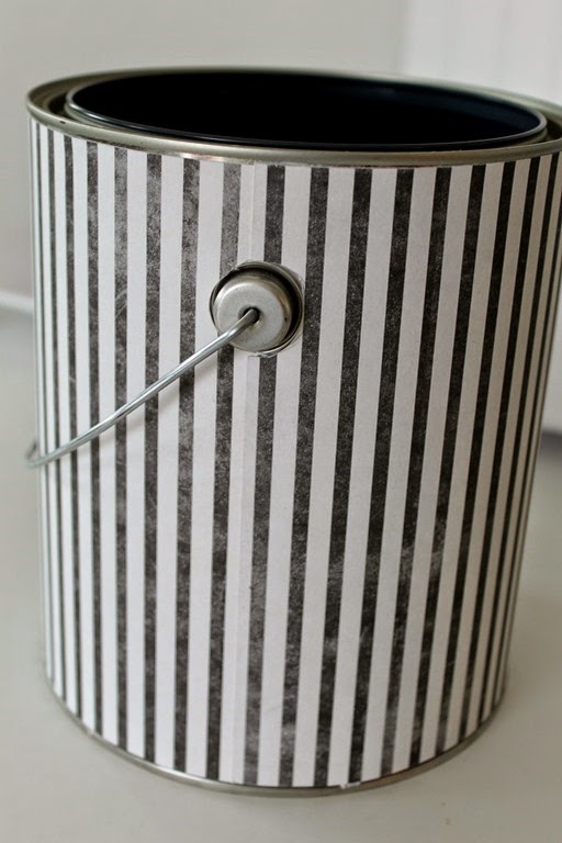 covering a paint can with scrapbook paper