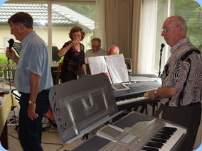 Our host for the day, Peter Brophy playing along with Len Hancy on vocals and Ron Stanwell and John Perkin jam along. Bev Barnes is seen getting into the action!