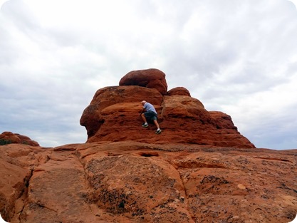 paul climbing rock