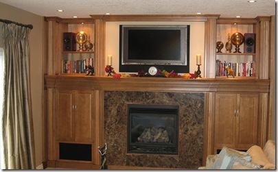 fireplace tv area at the back of the room