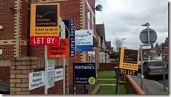 Letting agent boards in Newtown