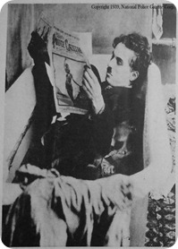 Chaplin reading the Police Gazette