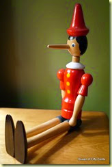 Pinocchio sitting