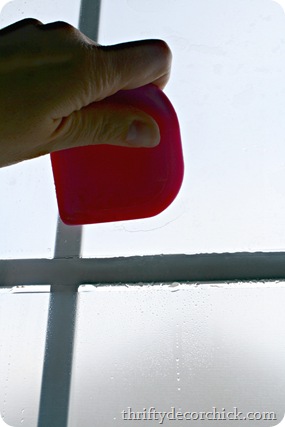 applying contact paper to window
