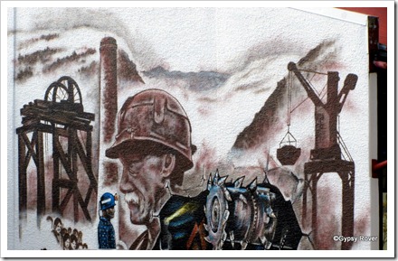 Mural of Greymouths history of coal mining.