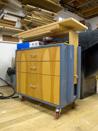 If you plan your storage correctly, you can maximize limited space. Here I'm using a rolling cabinet as an outfeed table.