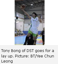 Tony Bong of DST goes for a lay up. Picture: BT/Yee Chun Leong 
