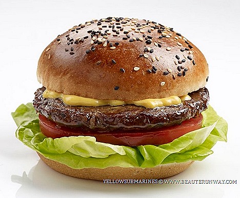 Yellow SubmarinesToa Payoh Restaurant Single Hit burger  features a large beef patty grilled tender perfection fresh greens, zesty sauce premium toasted black white sesame bread Torpedo fries cheese Dino Chick Junior Nuggets.
