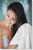 woman towel drying her hair