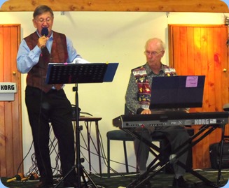 MC, Len Hancy, and Peter Brophy playing at the Raglan Club Saturday Night Concert. Peter is playing his Korg Pa3X