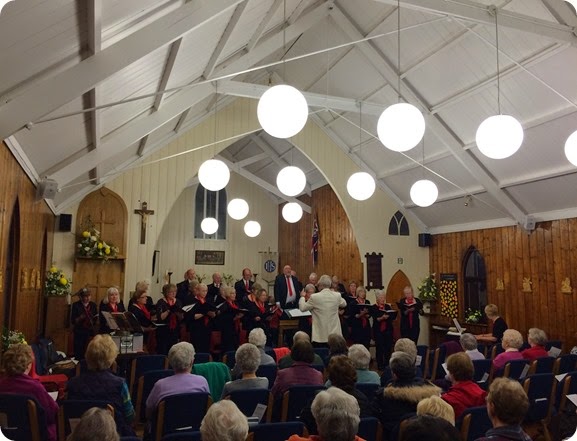 Musical Director Phil Houghton conducts the Wistaston  Singers