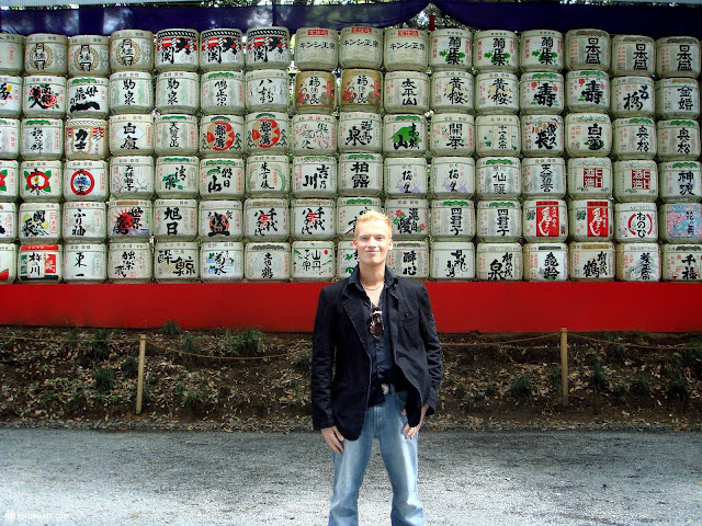 in front of a large amount of sake barrels in Yoyogi, Japan 