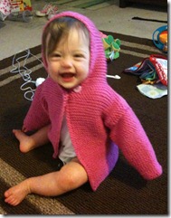 emily pink sweater