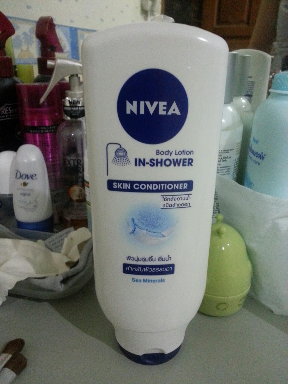 in shower body lotion dove