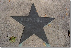 Alan Freed star marker in sidewalk next to marker