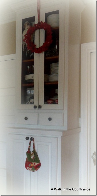 a walk in the countryside: christmas wreath on cabinet doors