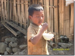 Refugee Child Eating