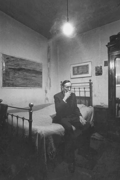 William S. Burroughs in his room at the Beat Hotel, Paris, 1959
