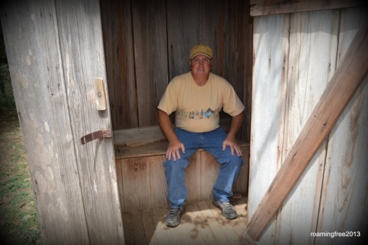 In the outhouse!