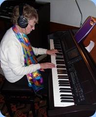 Eileen France having a practice   to get the feel of the piano keyboard