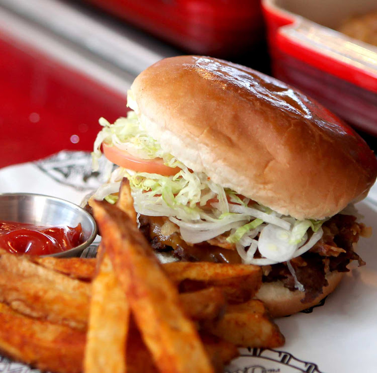 Guy’s Burger Joint is the ultimate poolside venue on board Carnival for hot burgers and hand-cut fries.