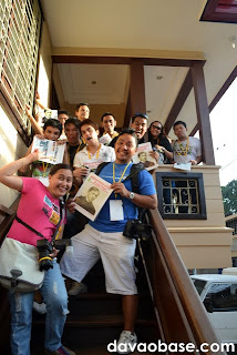 Wait, are those freebies you're all holding?!? Davao bloggers hamming it up at the Manila Bulletin office