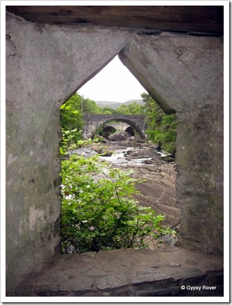 Looking up river through the Summer House windows at both bridges over the Invermoriston Falls.