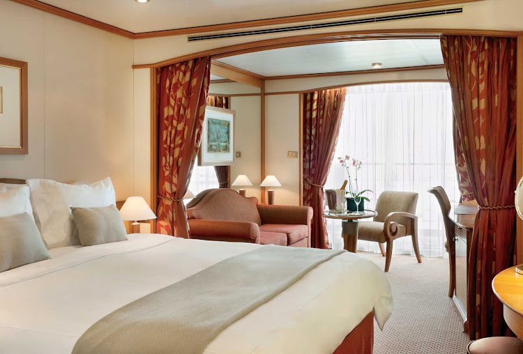 Stretch out in Silver Shadow's Veranda Suite, which features a teak veranda, sitting area and queen bed or twins.