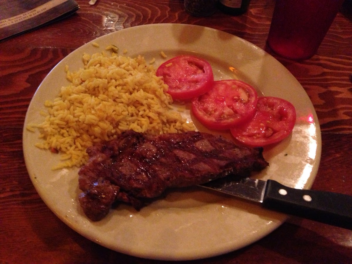 Steak, rice, tomatoes