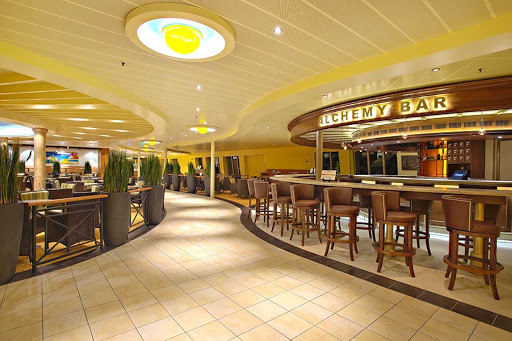 Grab a cocktail and meet new people at the Alchemy Bar aboard Carnival Sunshine. 