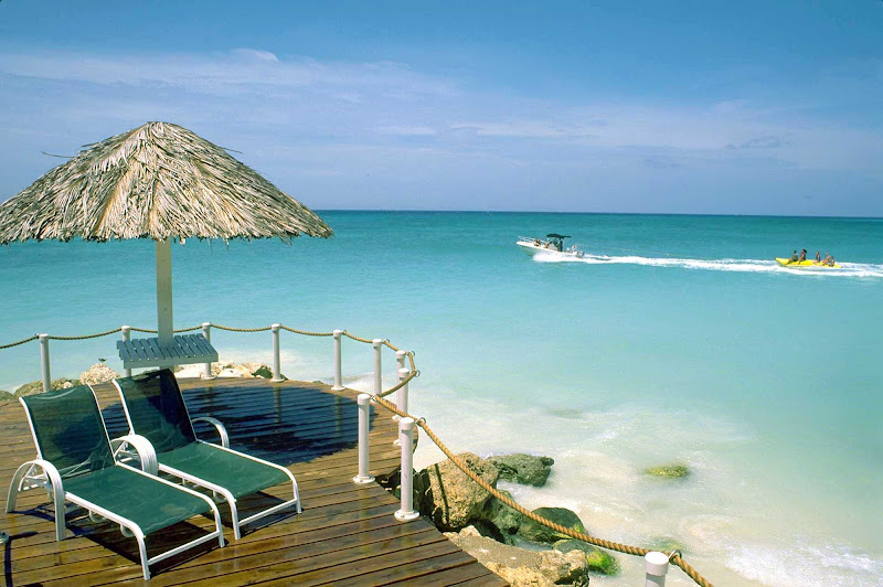 Aruba, unaffected by September's Caribbean storms, beckons with its warm, crystal waters and Dutch vibe.