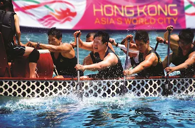 Dragon boat races in Hong Kong. The Dragon Boat Carnival has become one of the world's great parties.
