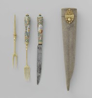 Een mes en vork in foedraal