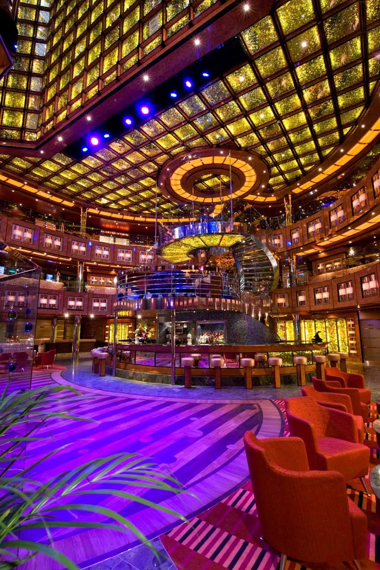 Carnival Dream's open and airy atrium is a kaleidoscope of colors.
