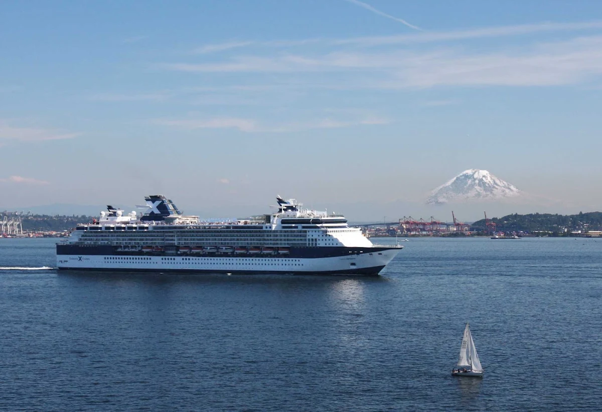 Celebrity-Infinity-Seattle - Celebrity Infinity sails out of Seattle Harbor with Mt. Rainier in the background.